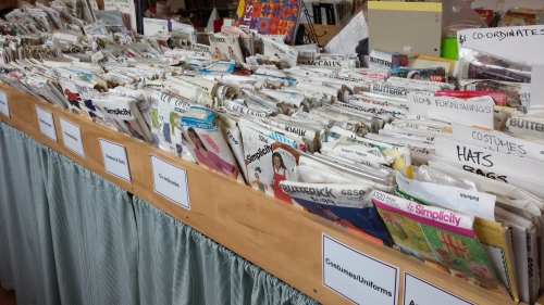 A table full of vintage patterns, all kept in order.  Amazing, when I think of how many people were rifling through them